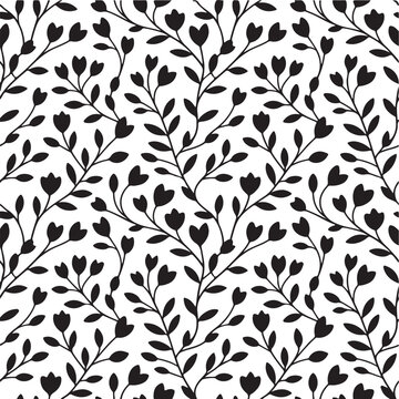 Seamless black and white floral pattern with delicate vines and leaves for elegant surface design