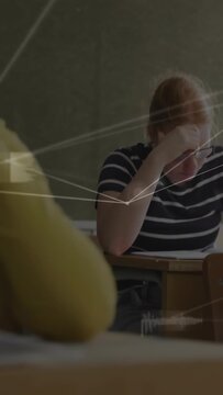 Vertical video: Teen student starting exam, leaning over paper, HUD lines aligning near head