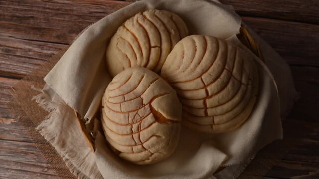 Low key video of artisanal Mexican sweet bread with sugar crust, Mexican conchas