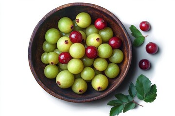 fresh green and red gooseberries in a rustic wooden bowl with green leaves on a white background, bright and refreshing still life