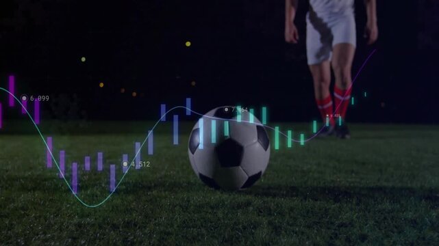 Sports data charts appearing prompt male player running in and kicking soccer ball, graphs syncing