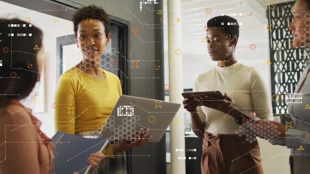 Yellow lead tilting laptop, talking, causing peer scrolling pad aligning tech data with HUD overlay