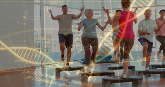 Instructor cueing step class in studio, group stepping on steps with DNA helix overlay for cardio