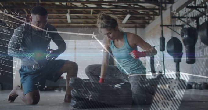 Woman settling astride heavy bag drilling hits for boxing, trainer cueing while overlays appearing