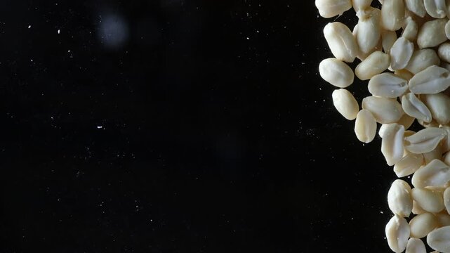 Peeled nuts are taken from the bottom