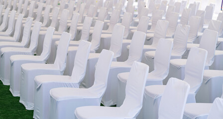 Fototapeta premium Large scale seating setup with many chairs prepared for an audience in a big event or conference environment.