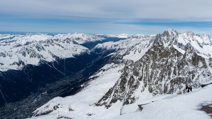 Fototapeta premium Panoramic view of jagged snowy peaks near Aiguille du Midi, Mont Blanc