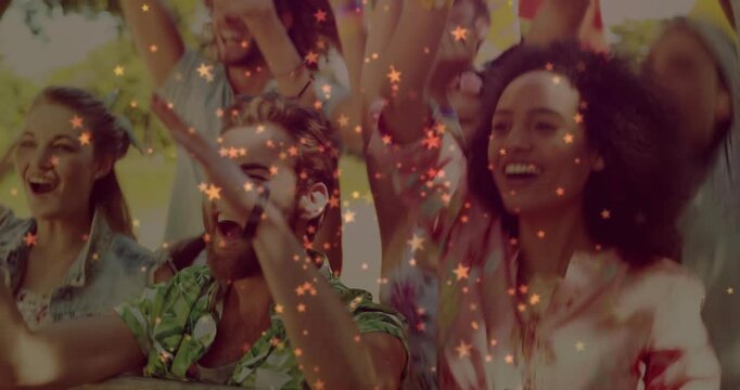 Festival front duo clapping and pumping fists, crowd cheering, stars overlaying after offstage cue