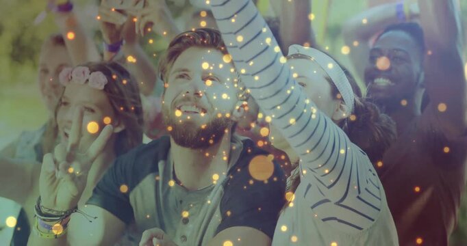 Bearded man leaning to stage as band starting crowd cheering phone filming particles floating