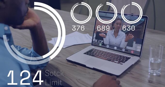 Man sitting business table watching laptop call, woman speaking sparking HUD rings tracking metrics