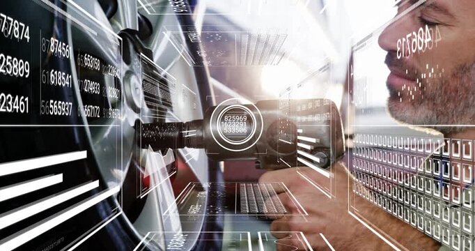 Auto tech aligning wrench to HUD reticle on wheel hub, torquing in bursts ensuring correct torque