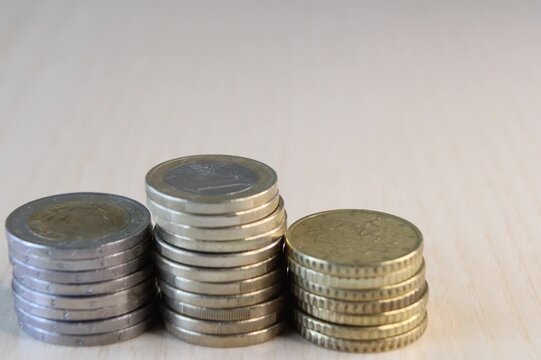 Stacking euro coins to show financial growth