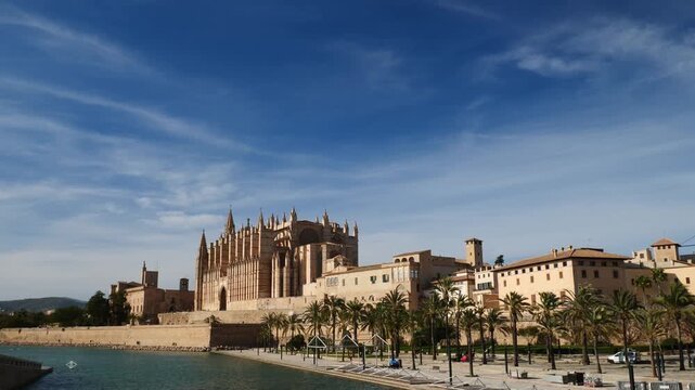 Static shot of Palma de Mallorca Cathedral and Old Town on a sunny winter day. Spain.