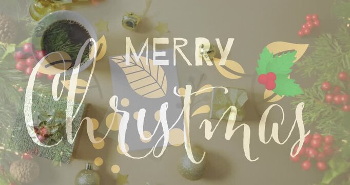 Animation of christmas greetings text over christmas presents and decorations