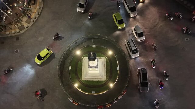 Night Traffic at Tugu Yogyakarta with Busy City Lights