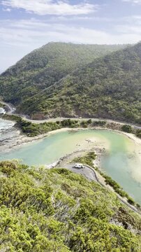 Famous stunning view from Teddy&rsquo;s Lookout showing the outlet river flowing into the turquoise ocean and surrounding hills near Lorne, Melbourne, Victoria, Australia