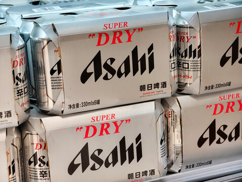 Shanghai,China-Ooc.7th 2025: Close-up Asahi Super Dry beer cans stacked on a shelf