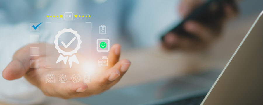 Healthcare quality rating concept with doctor use laptop to manage patient records and data protection system. Medical professional evaluating digital documents, certification and service performance.
