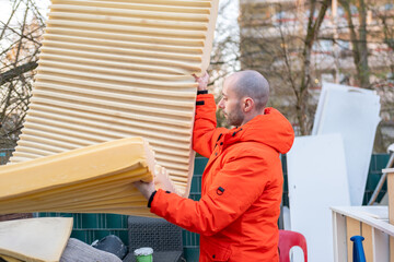 man bringing old items bulky waste collection point, disposing belongings, recycling and donation...