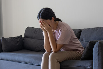 Obraz premium Fatigued Young Woman Indoors