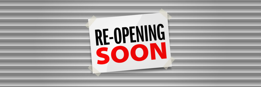 Re-Opening Soon poster on shop roller shutter