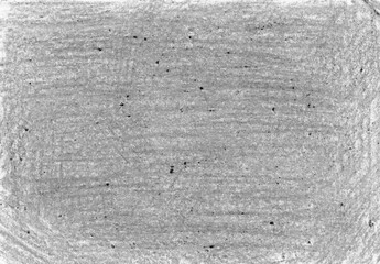 Obraz premium Background filled with texture of chaotic strokes. Strokes with pencils, chalk, wax crayons. Different shades of gray. Monochrome. White background visible. Black dots.