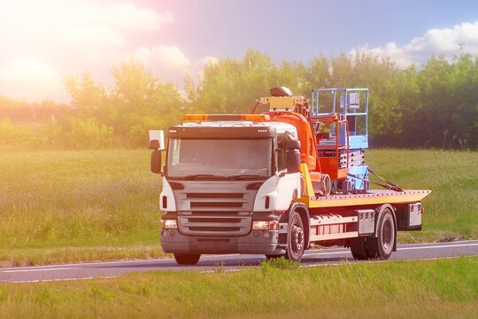 Commercial transport of oversized construction equipment