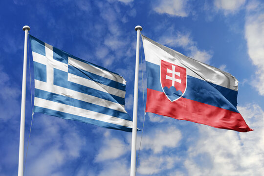Greece and Slovakia flags waving in a clear blue sky, symbolizing a powerful diplomacy, expanding global trade, a strategic partnership, and a shared vision of unity for a sustainable future.