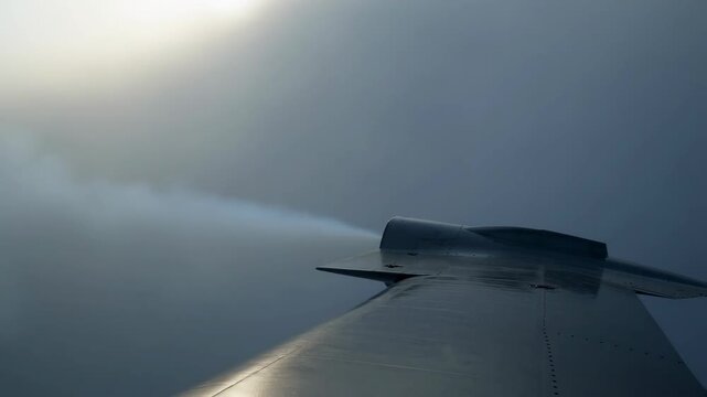 Airplane wing with smoke trailing behind in a cloudy sky featuring flight, aviation, aircraft with clouds and flying elements for plane, travel