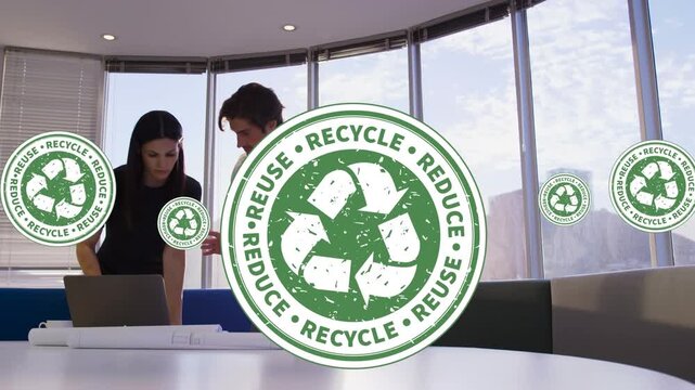 Animation of recycling icons over diverse female and male coworkers in office