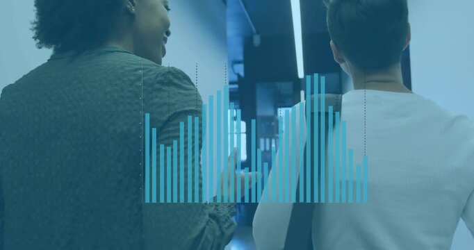 Bar chart animation over diverse business people walking in modern office hallway