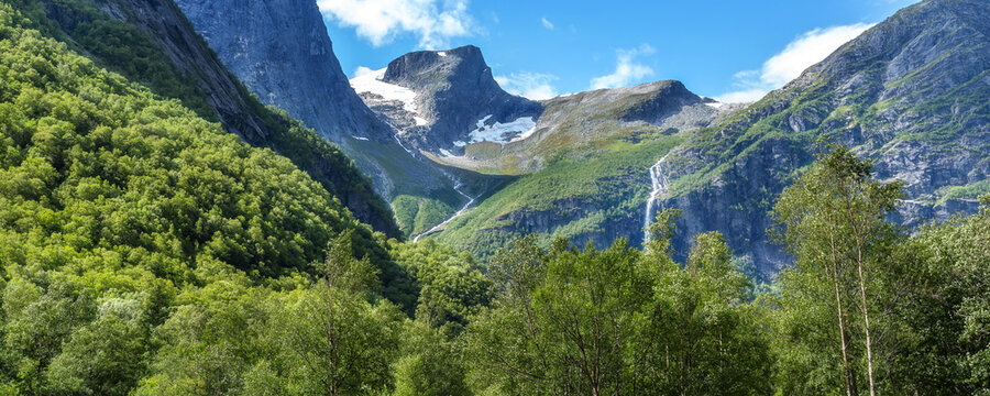 waterfalls on steep mountains in Olden, Norway