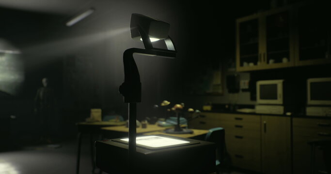 A dimly lit classroom features an overhead projector on a table. Shadows cast on the wall create a mysterious atmosphere, evoking nostalgia for past lessons and presentations.