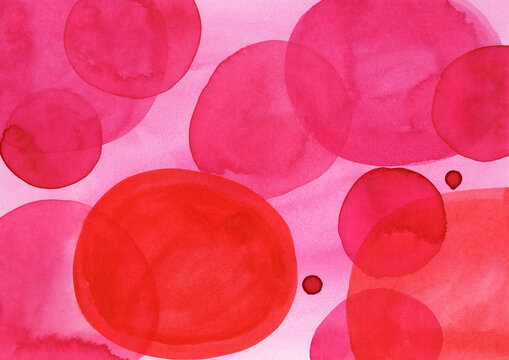 Abstract watercolor decor with pink and red bubbles and copy space