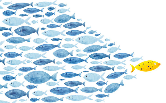 Yellow fish swimming against blue school representing individuality