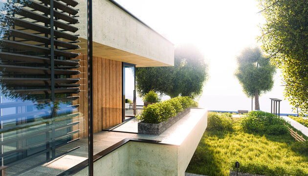 Modern house exterior with balcony and lush garden on a sunny day