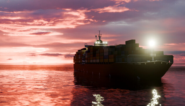 Container ship transporting goods at sunset on the ocean