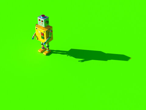 Yellow robot with shadow on green background in 3d rendering