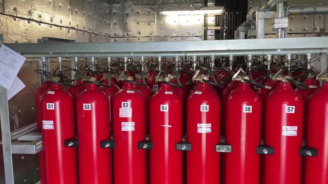 Red oxygen cylinders installed on the ship.