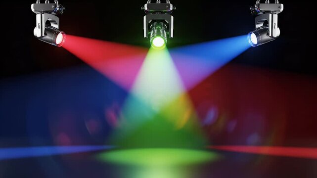 Three moving head spotlights casting red, green, and blue beams on a dark stage