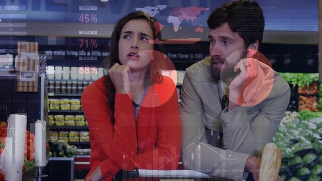 Woman gesturing starting charts and red dots overlaying as man listening in grocery, weighing costs