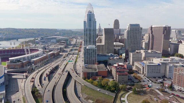 Aerial view of Cincinnati skyline with Great American Tower and interstate highway traffic in Ohio