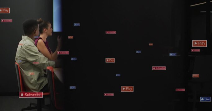 Vertical reveal exposing business team reviewing charts to discuss, floating icons continuing