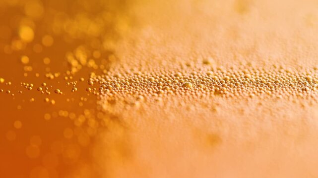 Macro Shot of Golden Carbonation Bubbles in Refreshing Drink