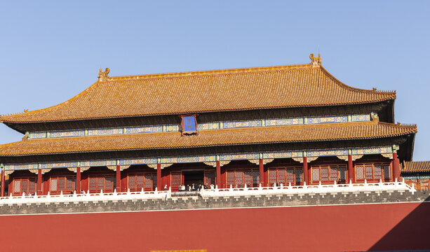View of the majestic architecture with its red walls and golden roof under a clear blue sky, a timeless scene of imperial grandeur, Beijing, Beijing, China.