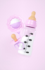 Fototapeta premium Baby bottle and pacifier with beanbag toy