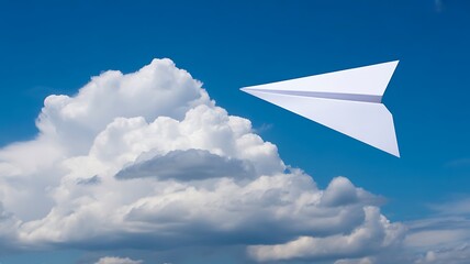 Fototapeta premium Paper airplane flying in blue sky with white clouds
