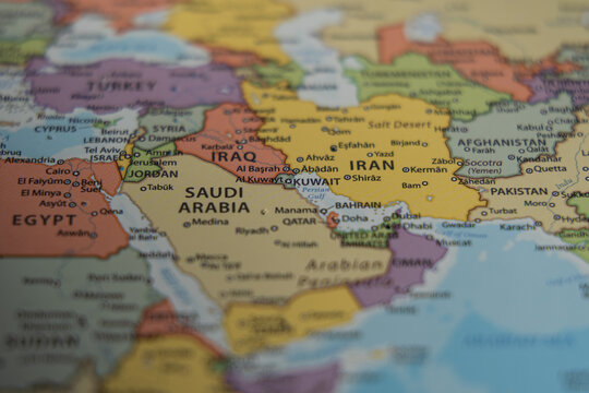 Middle East countries on a world map with focus on Saudi Arabia Iraq and Iran, representing regional geopolitics and international territory