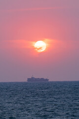 Obraz premium Sunset out of Tainan on the Taiwan west coast.