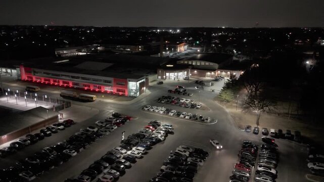 Night Aerial View of School Campus with Full Parking Lot